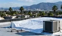 Temporary protection installed on a low-slope commercial rooftop